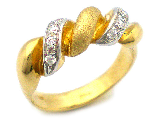 Anello fantasia in oro giallo e bianco 18kt con zirconi