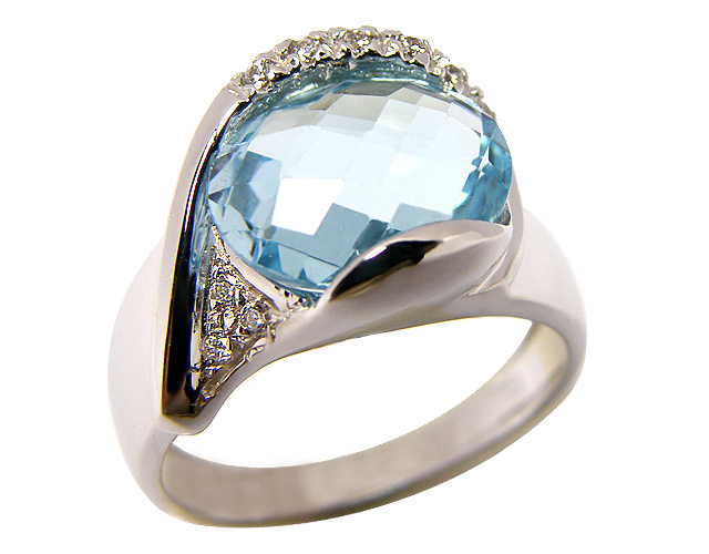 Anello in oro bianco 18kt con pietre sintetiche e topazio azzurro