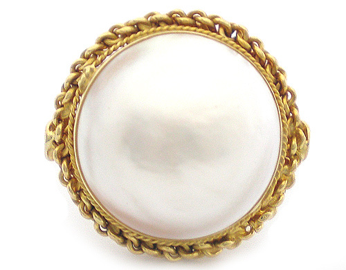 Anello in oro giallo 18kt e mezza perla