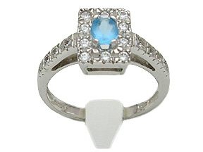 Anello oro bianco 18kt con zirconi e topazio azzurro