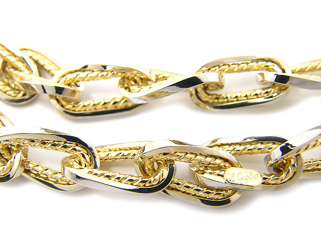Bracciale a maglie vuote in oro giallo e bianco 18kt