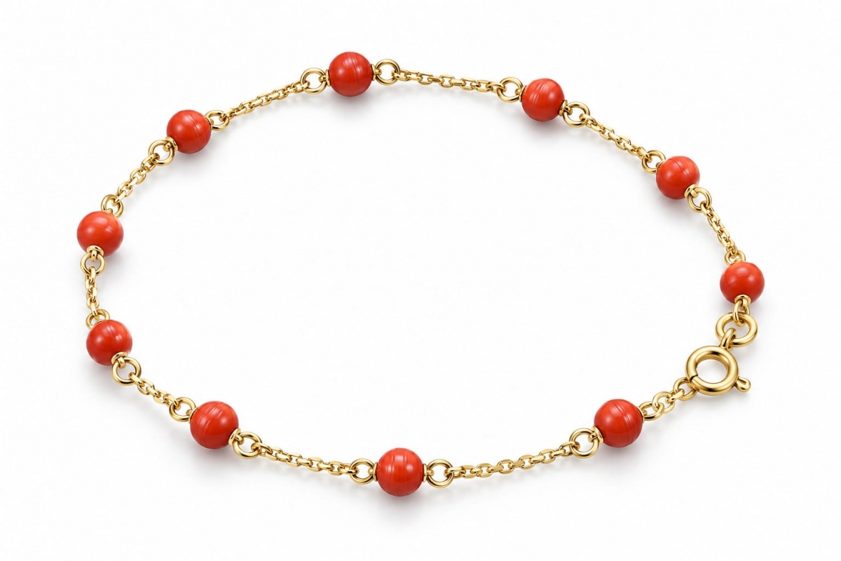 Bracciale da Bimba o Bimbo in oro giallo 18kt con corallini portafortuna