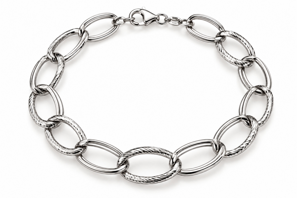 Bracciale Donna morbido a canna vuota grumetta bombata ovale in oro bianco 18kt