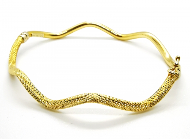 Bracciale Donna rigido a canna vuota in oro giallo 18kt