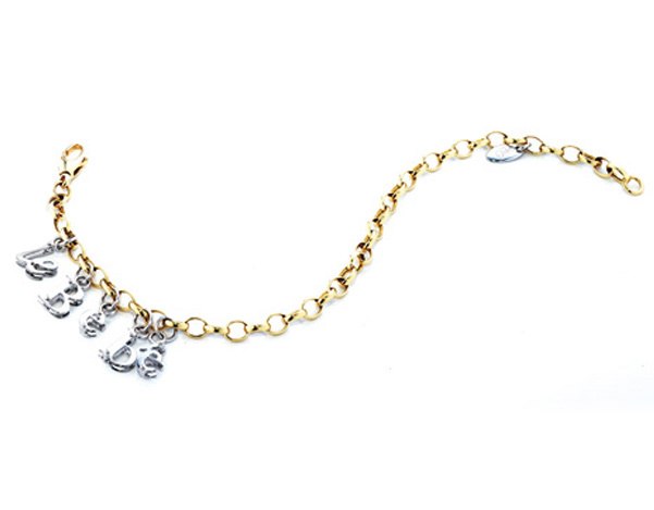 Bracciale Le Bebè in oro giallo e ciondoli a formare il marchio in oro bianco 18kt