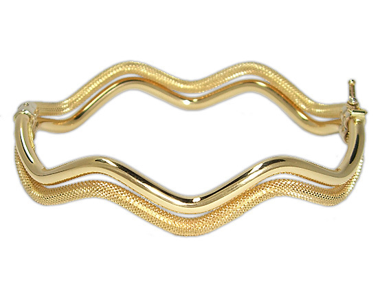 Bracciale rigido ad onda in oro giallo 18kt