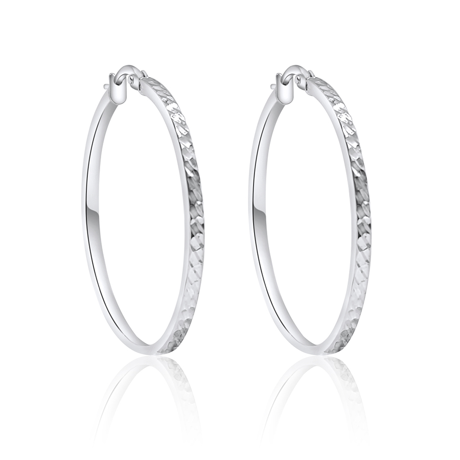 Orecchini a cerchio slim in oro bianco 18kt faccettato